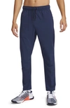 Nike Men's Unlimited Dri-fit Tapered Leg Versatile Pants In Obsidian/black/obsidian