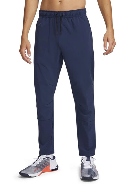 Nike Men's Unlimited Dri-fit Tapered Leg Versatile Pants In Obsidian/ Black/ Obsidian