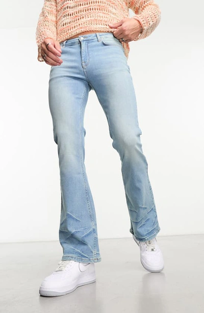 Asos Design Flare Jeans With Distressed Wash-blue