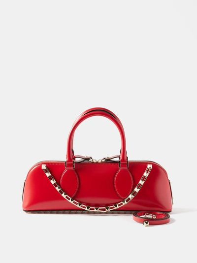 Valentino Garavani Rockstud Leather Duffle Bag In Red