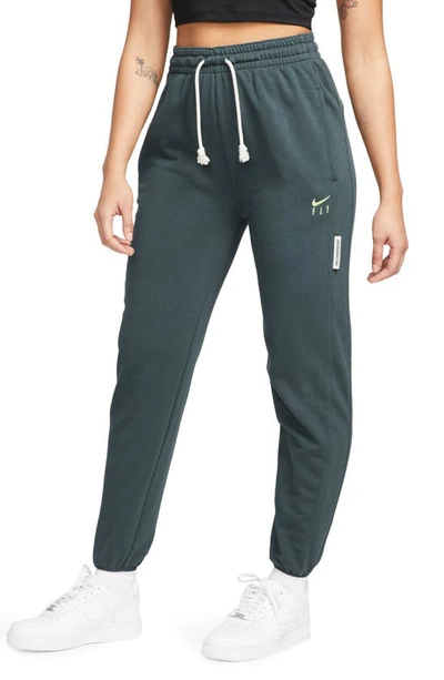 Nike Women's Dri-fit Swoosh Fly Standard Issue Basketball Pants In Green