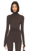 Norma Kamali Slim Fit Long Sleeve Turtle Top In Chocolate