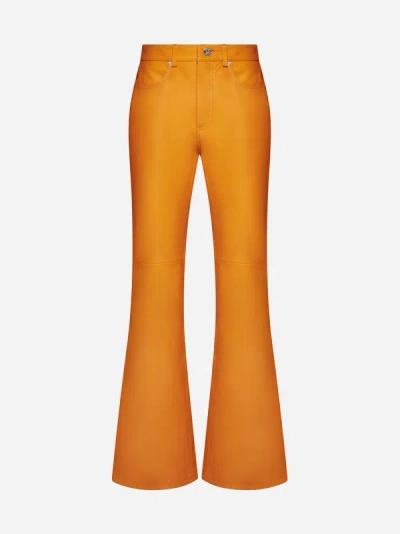 Jw Anderson Leather Bootcut-leg Trousers In Orange