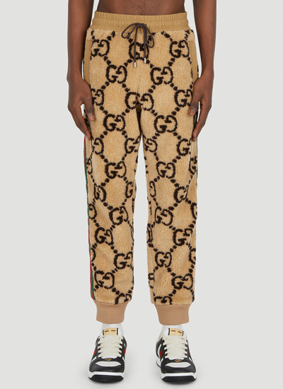 GUCCI GUCCI MEN GG JACQUARD FAUX FUR TRACK PANTS