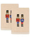 LINUM HOME TEXTILES LINUM HOME TEXTILES SET OF 2 CHRISTMAS NUTCRACKERS EMBROIDERED LUXURY TURKISH COTTON HAND TOWELS