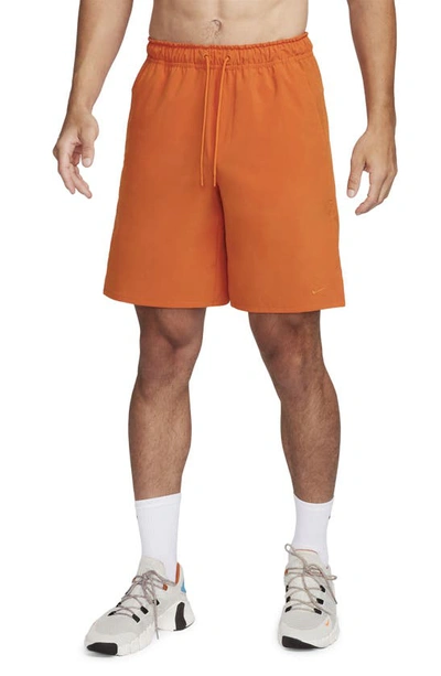 Nike Dri-fit Unlimited 7-inch Unlined Athletic Shorts In Campfire Orange