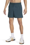 Nike Men's Unlimited Dri-fit 5" Unlined Versatile Shorts In Green