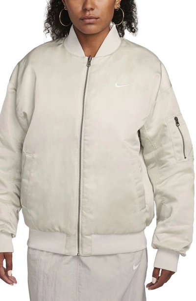 Nike Mini Swoosh Varsity Bomber Jacket In Light Orewood Brown-white