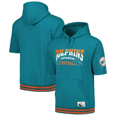MITCHELL & NESS MITCHELL & NESS AQUA MIAMI DOLPHINS PRE-GAME SHORT SLEEVE PULLOVER HOODIE