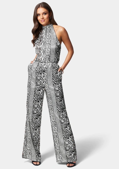 Bebe Wide Leg Printed Halter Jumpsuit In Animal Stripe