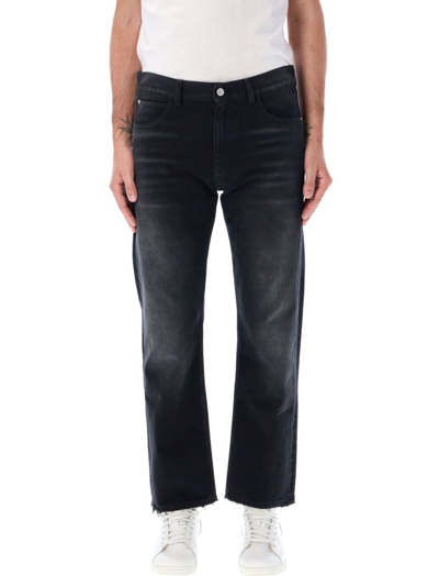 Marni Whiskering Effect Logo Patch Jeans In Black
