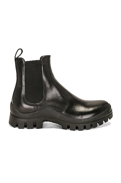The Row Ankle-length Leather Chelsea Boots In Black