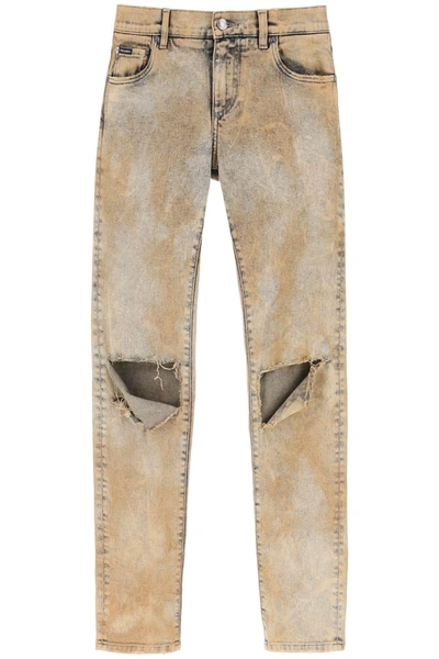 Dolce & Gabbana Skinny Stretch Jeans With Overdye And Rips In Beige
