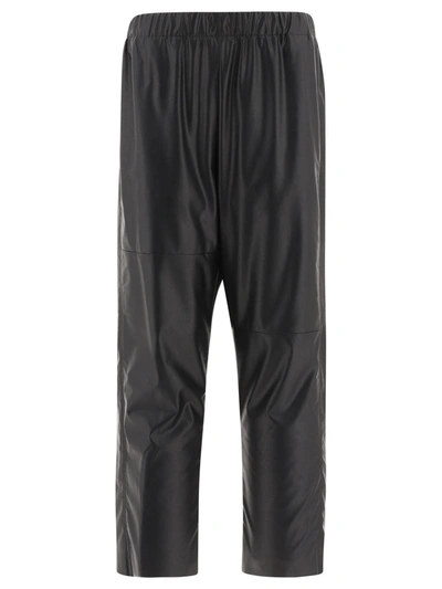 Mm6 Maison Margiela Stretched Faux Leather Trousers In Black