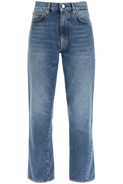 Totême Twisted Seam Slim Jeans In Worn Blue