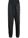 Givenchy Relaxed Fit Logo Embroidered Track Pants In Black