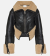 DION LEE REVERSIBLE LEATHER AND SHEARLING CROPPED JACKET