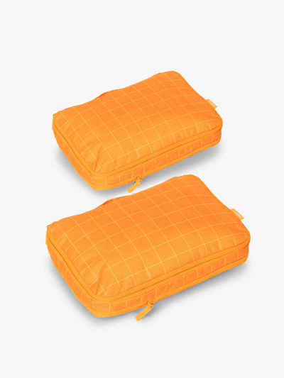 Calpak Medium Compression Packing Cubes In Orange Grid
