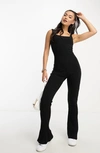 Asos Design Ribbed Strappy Unitard Jumpsuit In Black In Black