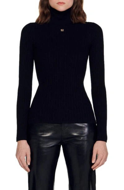 Sandro Cable Knit Turtleneck Sweater In Black