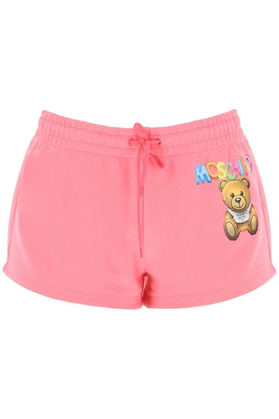 Moschino Logo Printed Shorts In Fuchsia