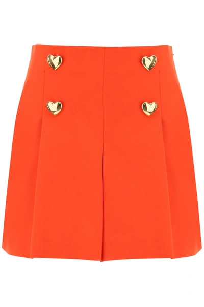 MOSCHINO SHORTS WITH HEARTSHAPED BUTTONS