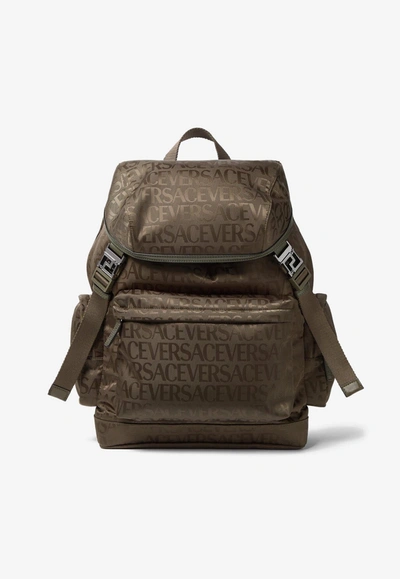 Versace All-over Logo Jacquard Backpack In Brown