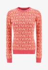 Versace Allover Logo Jacquard Sweater In Pink