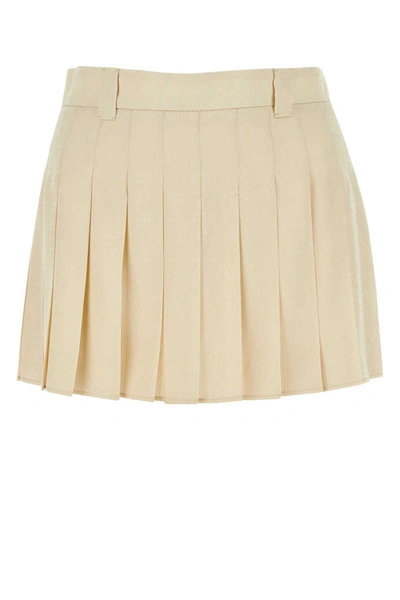 Miu Miu Mid Rise Pleated Mini Skirt In Beige