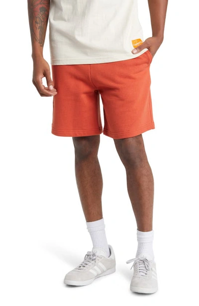 Carrots By Anwar Carrots Wordmark Cotton Logo Graphic Sweat Shorts In Orange