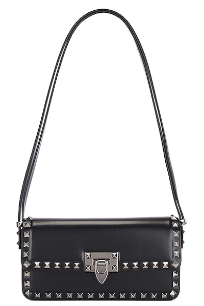 Valentino Garavani East West Rockstud Shoulder Bag In Nero