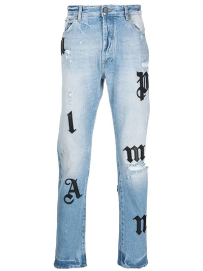 Palm Angels Logo Patch Denim Jeans In Blue