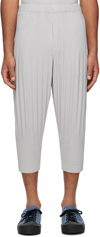 Issey Miyake Basic Pleated Tapered-leg Knitted Trousers In 11-lt.gray