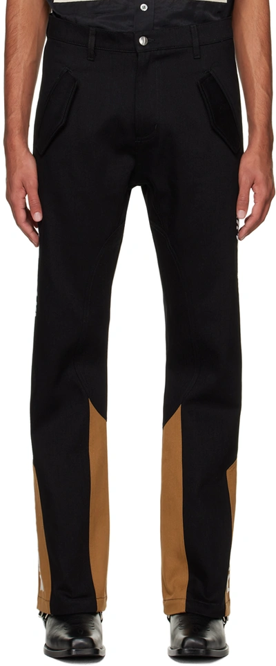 Rhude Logo-embroidered Panelled Trousers In Black