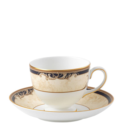 Wedgwood Cornucopia 22ct Yellow-gold Trim Bone-china Teacup And Saucer Set In Blue