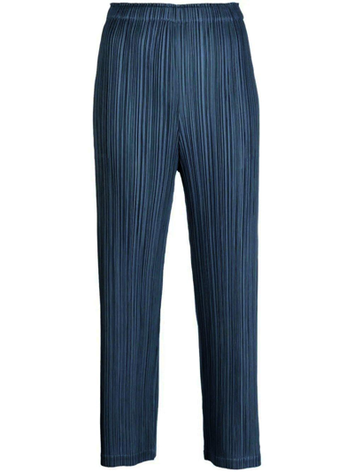 Issey Miyake Cropped Pleated Trousers In Blue