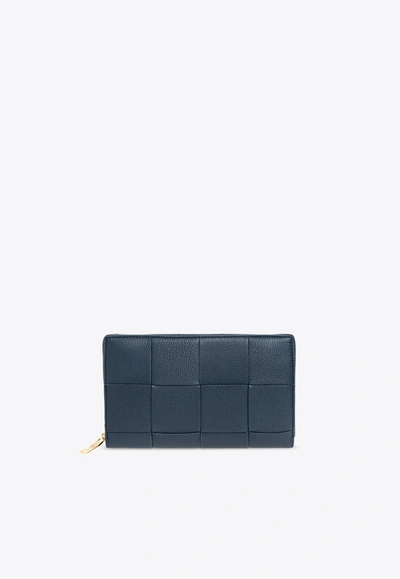 Bottega Veneta Cassette Zip-around Wallet In Intrecciato Leather In Deep Blue