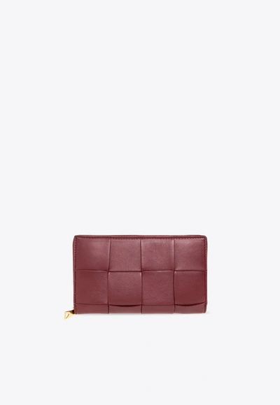 Bottega Veneta Cassette Zip-around Wallet In Intrecciato Leather In Bordeaux