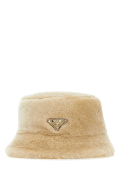 Prada Shearling Logo Plaque Bucket Hat In Beige