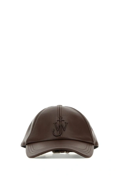 Jw Anderson Logo Embroidered Curved Peak Baseball Cap In Brown