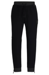 HUGO BOSS STRETCH-COTTON TRACKSUIT BOTTOMS WITH LOGO PATCH