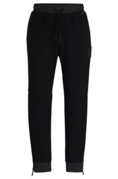 Hugo Boss Stretch-cotton Tracksuit Bottoms With Logo Patch In Black