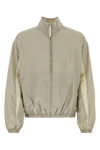 Reebok Versatile Stand-up Collar Windbreaker With Zip Pockets In Beige/ivory