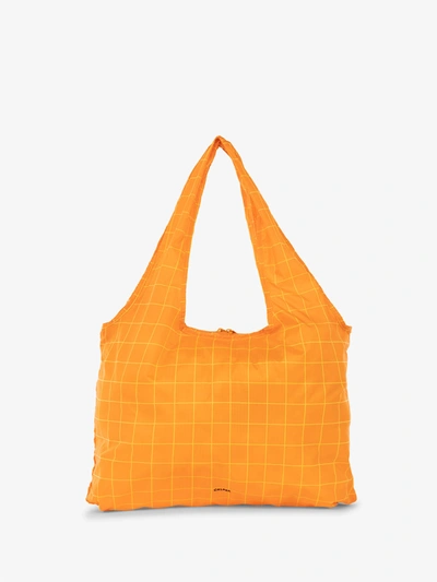 Calpak Compakt Tote Bag In Orange Grid