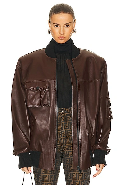 The Mannei Le Mans Leather Varsity Jacket In Brown