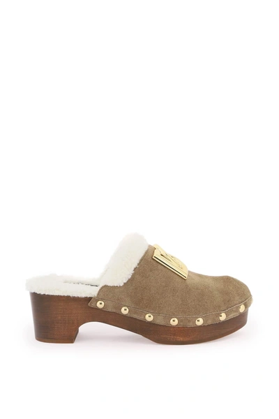 DOLCE & GABBANA SUEDE AND FAUX FUR CLOGS WITH DG LOGO.