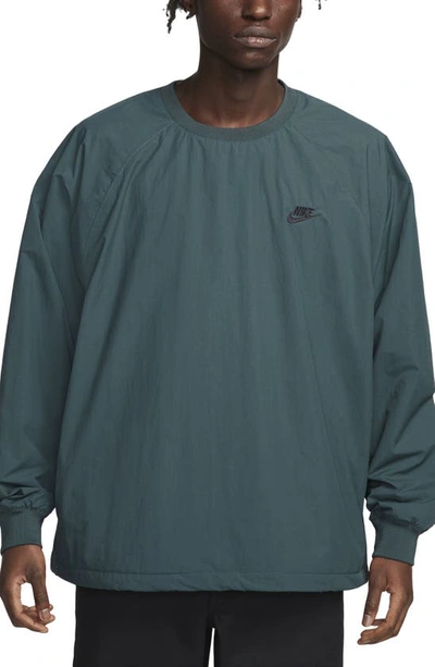 Nike Club Water Repellent Woven Crewneck Windshirt In Green