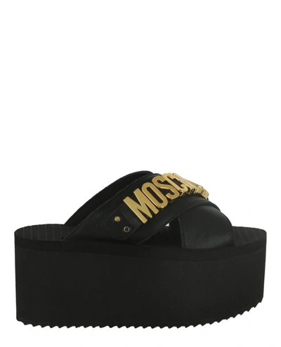 Moschino Logo Plaque Leather Wedge Sandal In Black