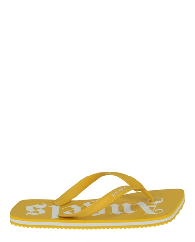 Palm Angels Logo-print Flip Flops In Yellow