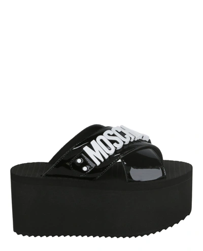 Moschino Logo Plaque Leather Wedge Sandal In Black